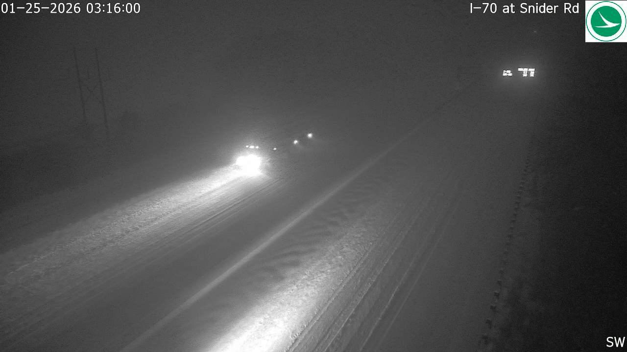 Typically shows a road or highway in Ohio with or without vehicles from a traffic camera.